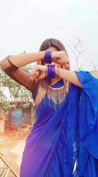 নীল শাড়ি পড়া পিক ও ক্যাপশন 1 নীল শাড়ি পড়া পিক
